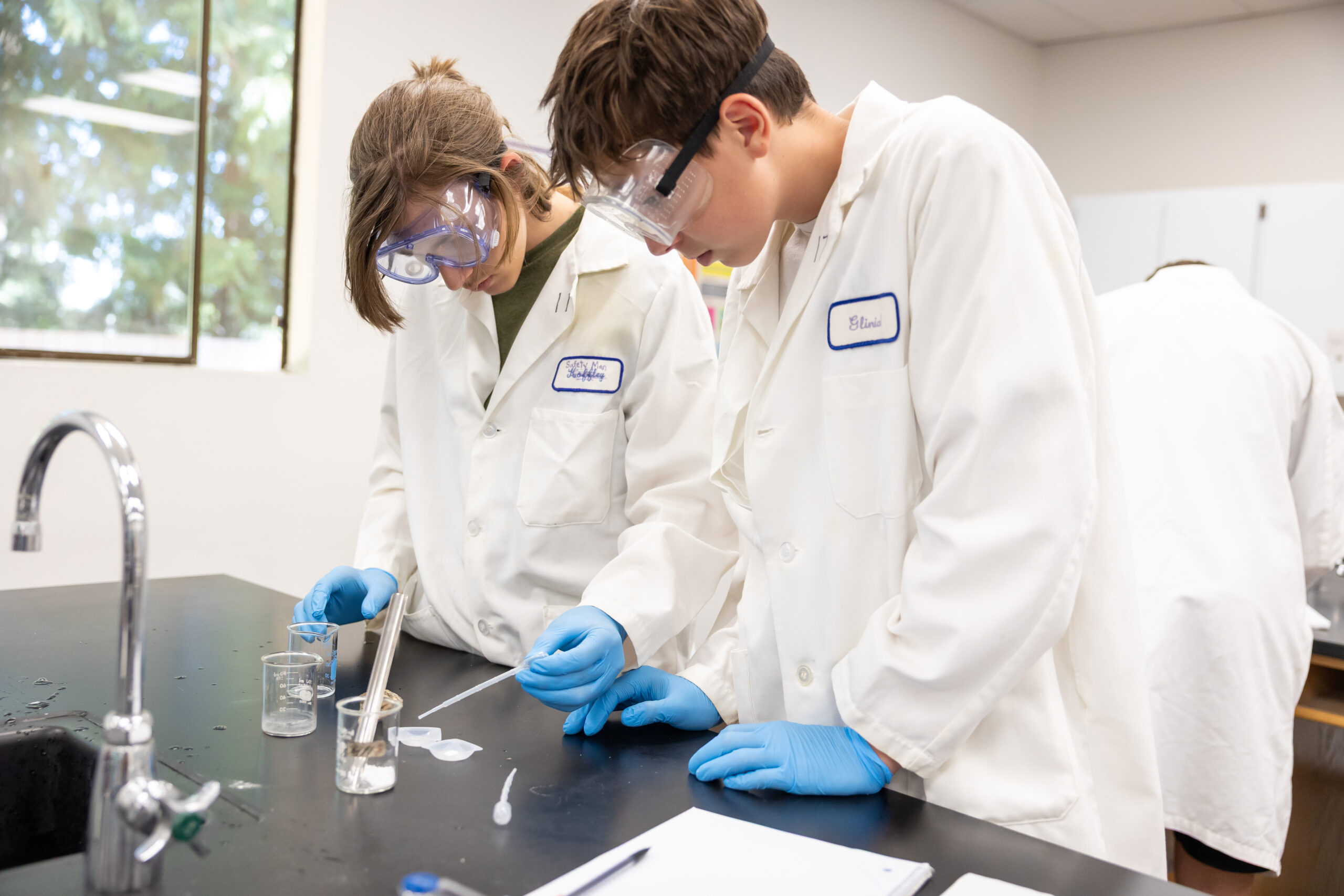 High school student reading during class